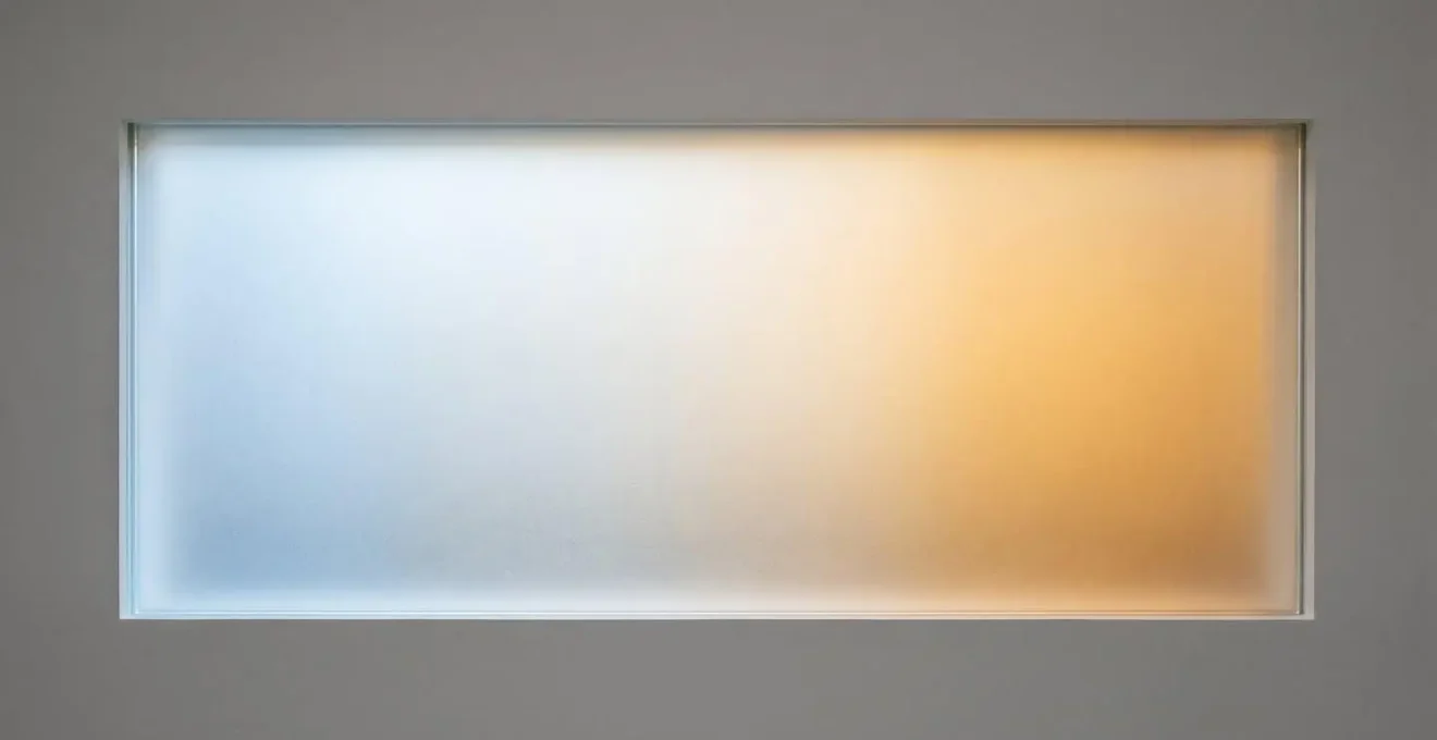 Gradient of light color temperatures from cool daylight to warm amber evening tones